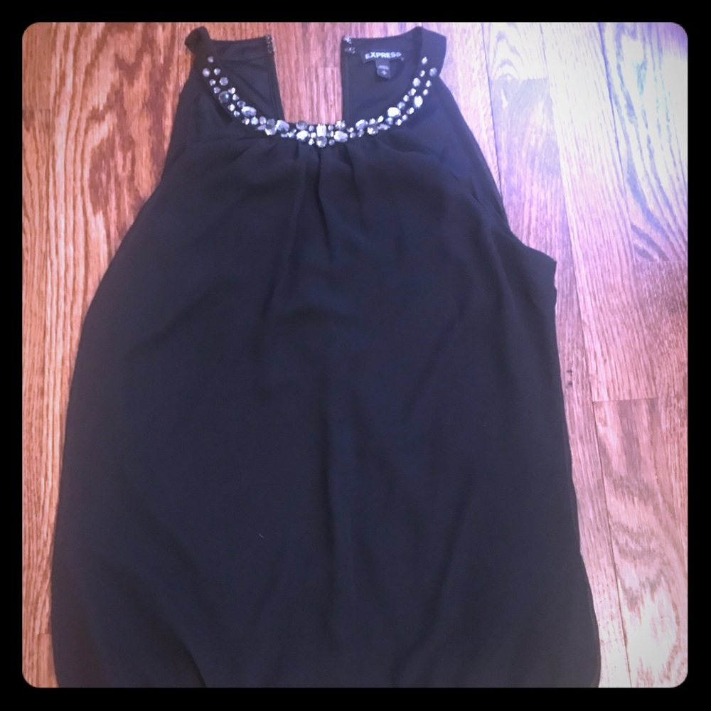 Sleeveless , jeweled top